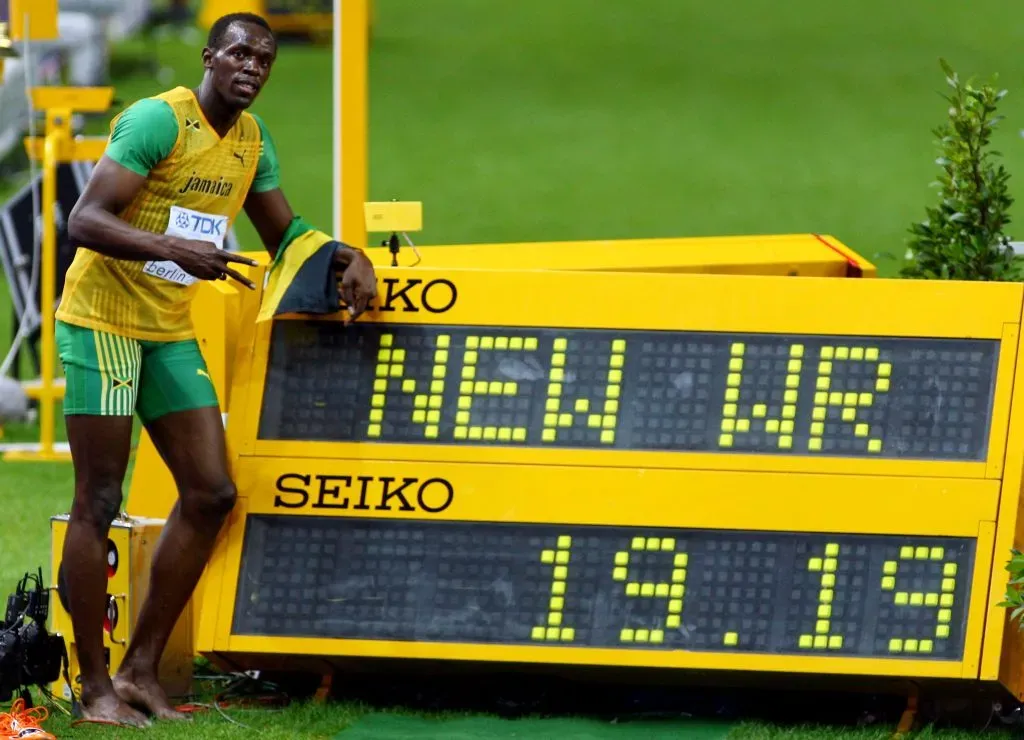 BERLIN – AUGUST 20:  Usain Bolt of Jamaica celebrates winning the gold medal in the men’s 200 Metres Final during day six of the 12th IAAF World Athletics Championships at the Olympic Stadium on August 20, 2009 in Berlin, Germany.  Bolt set a new World Record of 19.19 seconds.