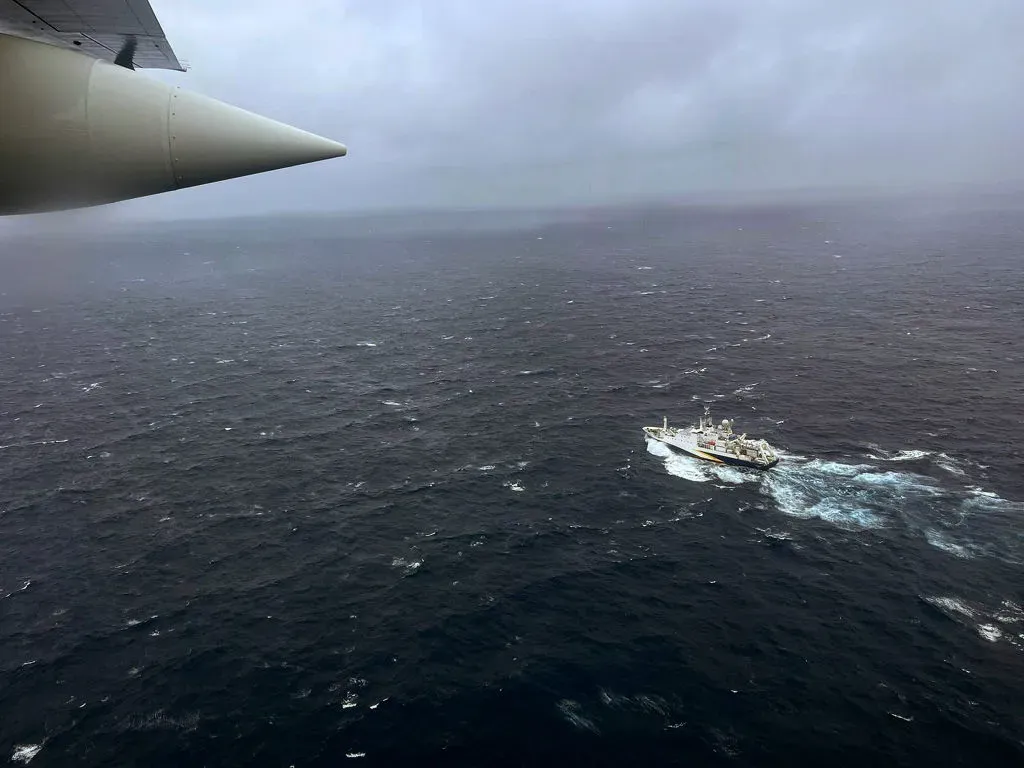 ATLANTIC OCEAN – JUNE 21: In this U.S. Coast Guard handout, a Coast Guard Air Station Elizabeth City, North Carolina HC-130 Hercules airplane flies over the French research vessel, L’Atalante approximately 900 miles East of Cape Cod during the search for the 21-foot submersible, Titan, June 21, 2023 over the Atlantic Ocean. The unified command is searching for five people after the Canadian research vessel Polar Prince lost contact with their submersible during a dive to the wreck of the Titanic on June 18, 2023. (Photo by U.S. Coast Guard via Getty Images)