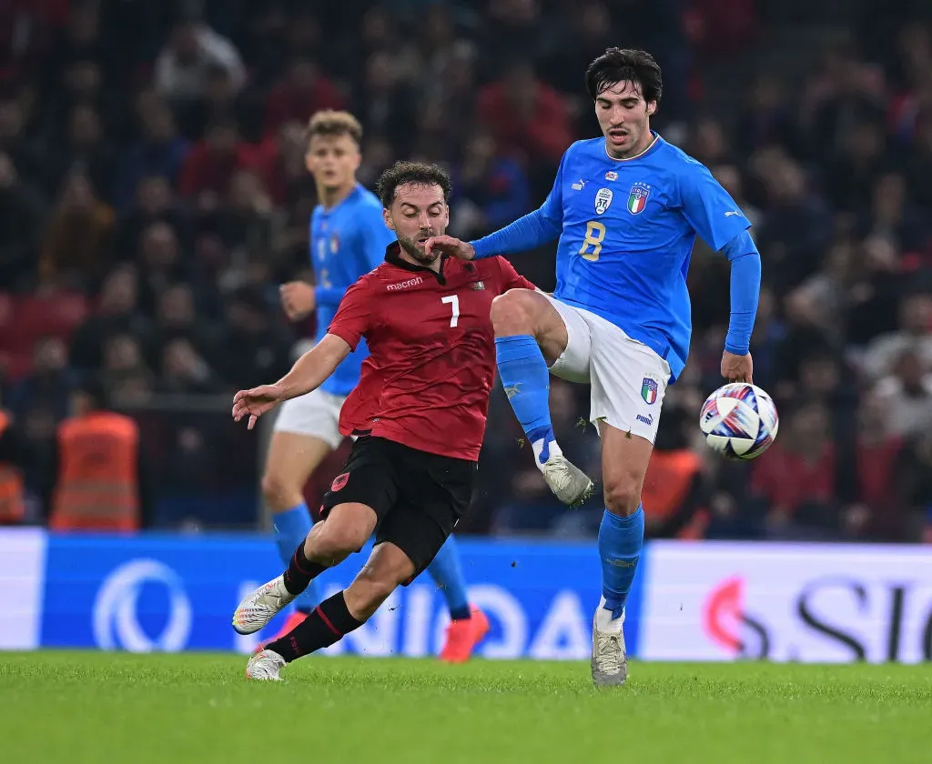 TIRANA, ALBANIA – NOVEMBER 16: Sandro Tonali of Italy competes for the ball with Bare of Albania during the International friendly match between Albania and Italy at on November 16, 2022 in Tirana, Albania. (Photo by Mattia Ozbot/Getty Images)