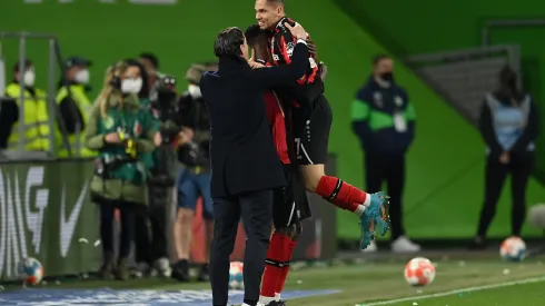 WOLFSBURG, GERMANY - MARCH 20: Paulinho of Bayer 04 Leverkusen celebrates after scoring their side's first goal during the Bundesliga match between VfL Wolfsburg and Bayer 04 Leverkusen at Volkswagen Arena on March 20, 2022 in Wolfsburg, Germany. (Photo by Stuart Franklin/Getty Images)