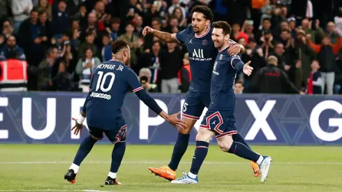 PARIS, FRANCE - APRIL 23: Lionel Messi #30 of Paris Saint-Germain celebrates his goal with Marquinhos #5 of Paris Saint-Germain and Neymar Jr #10 of Paris Saint-Germain during the Ligue 1 Uber Eats match between Paris Saint Germain and RC Lens at Parc des Princes on April 23, 2022 in Paris, France. (Photo by Catherine Steenkeste/Getty Images)