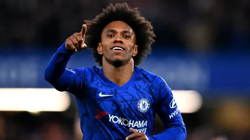 Willian of Chelsea celebrates after scoring his sides first goal during the FA Cup Fifth Round match between Chelsea FC and Liverpool FC at Stamford Bridge on March 03, 2020 in London, England.
