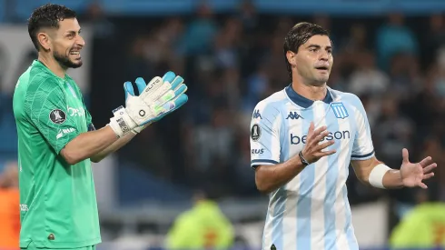 Gabriel Arias of Racing Club and Santiago Sosa of Racing Club complain to a linesman during a Copa CONMEBOL Libertadores 2025 match between Racing Club and Colo Colo at Presidente Peron Stadium on May 14, 2025 in Avellaneda, Argentina.
