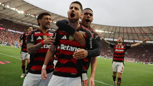 : Jorginho of Flamengo celebrates with Giorgian de Arrascaeta, Samuel Lino after scoring the second goal of his team during the match between Flamengo and Palmeiras as part of Brasileirao 2025 at Maracana Stadium on October 19, 2025 in Rio de Janeiro, Brazil. (Photo by Wagner Meier/Getty Images)