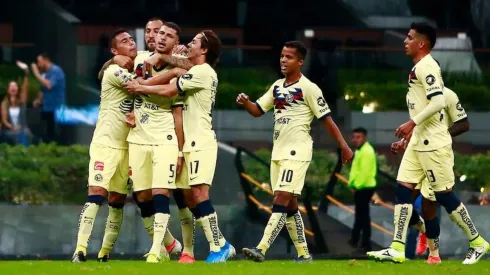 América celebrando el triunfo ante Xolos.