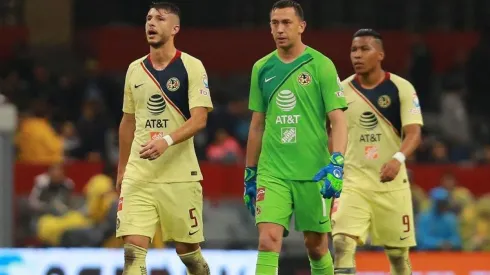 Guido Rodríguez y Agustín Marchesín en el América.