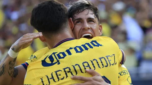 CHICAGO, ILLINOIS – AUGUST 03: Illian Hernandez #19 of Club América celebrates his goal with Cristian Calderon #18 of Club América against the Aston Villa during the second half in the pre-season friendly at Soldier Field on August 03, 2024 in Chicago, Illinois. (Photo by Justin Casterline/Getty Images)