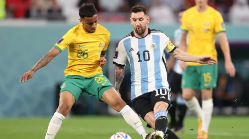 DOHA, QATAR - DECEMBER 03: Lionel Messi of Argentina battles for possession with Keanu Baccus of Australia during the FIFA World Cup Qatar 2022 Round of 16 match between Argentina and Australia at Ahmad Bin Ali Stadium on December 03, 2022 in Doha, Qatar. (Photo by Alex Pantling/Getty Images)