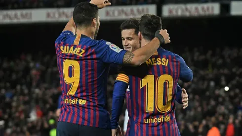 Messi y Suárez, junto a Philippe Coutinho en Barcelona en 2019.
