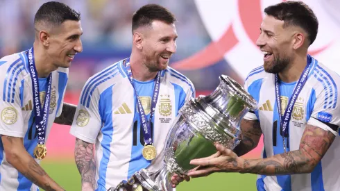 Di María, Messi y Otamendi en la última conquista.