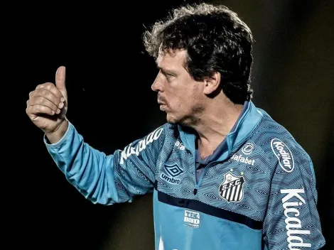 Diniz conversa com medalhão nos bastidores