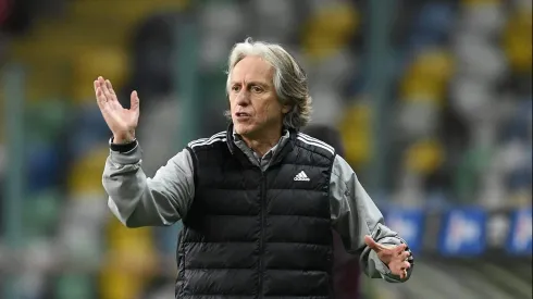 AVEIRO, PORTUGAL - DECEMBER 23: Jorge Jesus, head coach of Benfica gives their team instructions during the Portuguese Super Cup final between FC Porto and SL Benfica at Estadio Municipal de Aveiro on December 23, 2020 in Aveiro, Portugal. Sporting stadiums around Portugal remain under strict restrictions due to the Coronavirus Pandemic as Government social distancing laws prohibit fans inside venues resulting in games being played behind closed doors. (Photo by Octavio Passos/Getty Images)