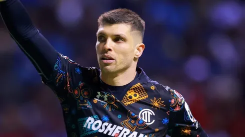 PUEBLA, MEXICO - APRIL 07: Tiago Volpi goalkeeper of Toluca celebrates after scoring the team's second goal during the 14th round match between Puebla and Toluca as part of the Torneo Clausura 2023 Liga MX at Cuauhtemoc Stadium on April 07, 2023 in Puebla, Mexico. (Photo by Hector Vivas/Getty Images)