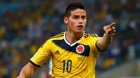 RIO DE JANEIRO, BRAZIL - JUNE 28: James Rodriguez of Colombia celebrates scoring his team's second goal and his second of the game during the 2014 FIFA World Cup Brazil round of 16 match between Colombia and Uruguay at Maracana on June 28, 2014 in Rio de Janeiro, Brazil. (Photo by Clive Rose/Getty Images)