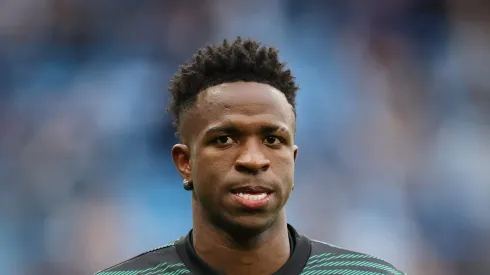 Vinicius Junior of Real Madrid warms up prior to the UEFA Champions League semi-final second leg match between Manchester City FC and Real Madrid at Etihad Stadium (Photo by Clive Brunskill/Getty Images)