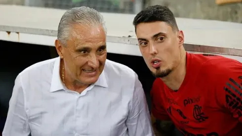 Tite e seu filho conversam no jogo contra o Fluminense. Foto: Wagner Meier/Getty Images.