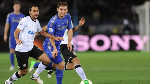 YOKOHAMA, JAPAN - DECEMBER 16: Branislav Ivanovic of Chelsea and Danilo of Corinthians chase the ball during the FIFA Club World Cup Final Match between Corinthians and Chelsea at International Stadium Yokohama on December 16, 2012 in Yokohama, Japan. (Photo by Kaz Photography/Getty Images)