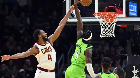 CLEVELAND, OHIO - FEBRUARY 28: Evan Mobley #4 of the Cleveland Cavaliers fouls Jarred Vanderbilt #8 of the Minnesota Timberwolves during the second half at Rocket Mortgage Fieldhouse on February 28, 2022 in Cleveland, Ohio. The Timberwolves defeated the Cavaliers 127-122. NOTE TO USER: User expressly acknowledges and agrees that, by downloading and/or using this photograph, user is consenting to the terms and conditions of the Getty Images License Agreement. (Photo by Jason Miller/Getty Images)