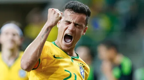 Philippe Coutinho comemorando gol pela Seleção Brasileira, durante amistoso contra o México.