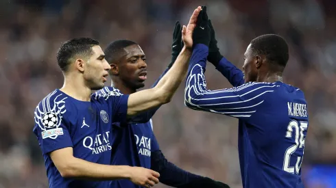 BIRMINGHAM, ENGLAND – APRIL 15: Nuno Mendes of Paris Saint-Germain celebrates with teammates Ousmane Dembele and Achraf Hakimi after scoring his team's second goal during the UEFA Champions League 2024/25 Quarter Final Second Leg match between Aston Villa FC and Paris Saint-Germain at Villa Park on April 15, 2025 in Birmingham, England. (Photo by Dan Istitene/Getty Images)