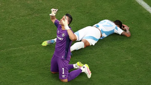 EAST RUTHERFORD, NEW JERSEY – JUNE 21: Fabio #1 of Fluminense FC reacts as Erick Farias #97 of Ulsan HD looks dejected during the FIFA Club World Cup 2025 group F match between Fluminense FC and Ulsan HD FC at MetLife Stadium on June 21, 2025 in East Rutherford, New Jersey. (Photo by Al Bello/Getty Images)