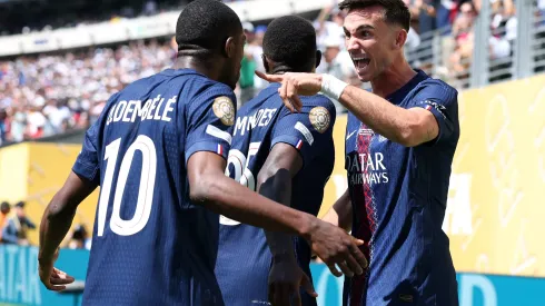 EAST RUTHERFORD, NEW JERSEY – JULY 09: Fabian Ruiz #8 of Paris Saint-Germain scores his team's first goal with teammate Ousmane Dembele during the FIFA Club World Cup 2025 semi-final match between Paris Saint-Germain and Real Madrid CF at MetLife Stadium on July 09, 2025 in East Rutherford, New Jersey. (Photo by Buda Mendes/Getty Images)