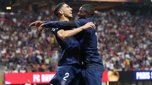 ATLANTA, GEORGIA – JULY 05: Ousmane Dembele #10 of Paris Saint-Germain celebrates scoring his team's second goal with teammate Achraf Hakimi #2 during the FIFA Club World Cup 2025 quarter-final match between Paris Saint-Germain and FC Bayern München at Mercedes-Benz Stadium on July 05, 2025 in Atlanta, Georgia. (Photo by Kevin C. Cox/Getty Images)