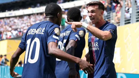 EAST RUTHERFORD, NEW JERSEY – JULY 09: Fabian Ruiz #8 of Paris Saint-Germain scores his team's first goal with teammate Ousmane Dembele during the FIFA Club World Cup 2025 semi-final match between Paris Saint-Germain and Real Madrid CF at MetLife Stadium on July 09, 2025 in East Rutherford, New Jersey. (Photo by Buda Mendes/Getty Images)