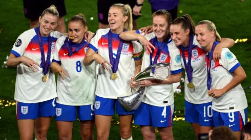 BASEL, SWITZERLAND – JULY 27: Alessia Russo, Georgia Stanway, Leah Williamson, Keira Walsh, Ella Toone and Beth Mead of England pose for a photograph with the UEFA Women's EURO trophy after their team's victory in the UEFA Women's EURO 2025 Final match between England and Spain at St. Jakob-Park on July 27, 2025 in Basel, Switzerland. (Photo by Matthias Hangst/Getty Images)