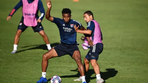 LISBON, PORTUGAL – AUGUST 18: Thiago Mendes of Olympique Lyon trains with Rafael of Olympique Lyon during a training session ahead of their UEFA Champions League Semi Final match against Bayern Munich at Estadio do Restelo on August 18, 2020 in Lisbon, Portugal. (Photo by Franck Fife/Pool via Getty Images)