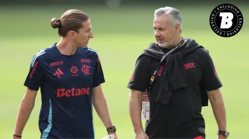 Filipe Luís e José Boto conversando durante a preparação do Flamengo para a Libertadores