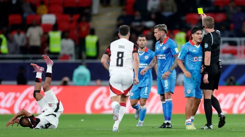 DOHA, QATAR – DECEMBER 10: Gonzalo Piovi of Cruz Azul is shown a yellow card after appearing to push Nicolas de la Cruz of CR Flamengo (L) during the FIFA Derby of the Americas 2025 match between Cruz Azul and CR Flamengo at Ahmad Bin Ali Stadium on December 10, 2025 in Doha, Qatar. (Photo by Getty Images/Getty Images)