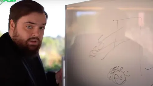 Ibai dibujando al ingeniero Pellegrini en una pizarra.