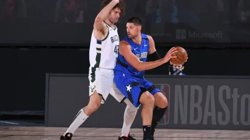 Robin Lopez of Bucks guarding Nikola Vucevic. (Getty)