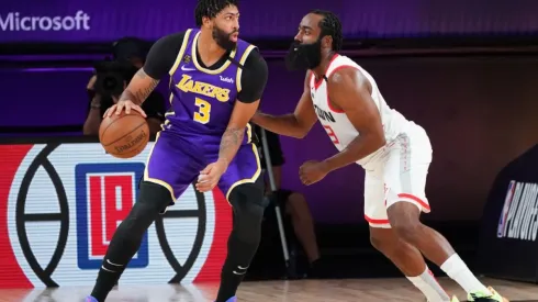 James Harden guarding Anthony Davis in the post. (Getty)