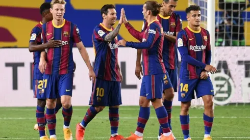 Barcelona's Lionel Messi celebrate with teammates after scoring against Villarreal (Getty).