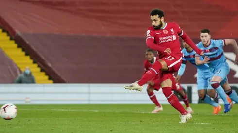 Liverpool's Mo Salah shoots a penalty to score for his team against West Ham (Getty).