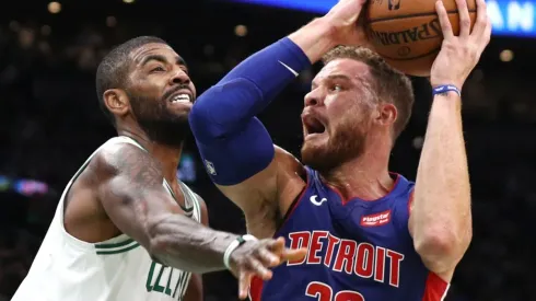 Kyrie Irving (left) of the Boston Celtics defends Blake Griffin (right) of the Detroit Pistons. (Getty)