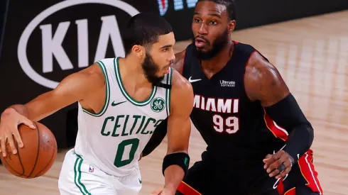 Jayson Tatum of the Boston Celtics (left) drives against Jae Crowder of the Miami Heat (right). (Getty)