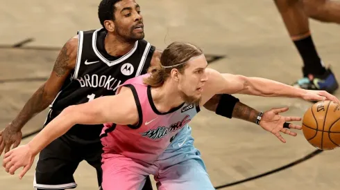 Kyrie Irving of Brooklyn Nets & Kelly Olynyk of Miami Heat. (Getty)