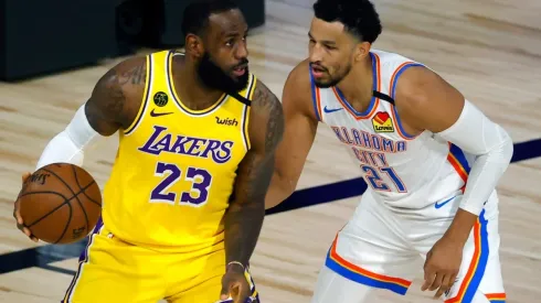 LeBron James (left) of the Los Angeles Lakers is defended by Andre Roberson (right) of the Oklahoma City Thunder. (Getty)