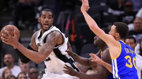 LaMarcus Aldridge & Stephen Curry. (Getty)