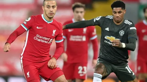 Thiago Alcantara of Liverpool (left) battles for possession with Marcus Rashford of Manchester United (right). (Getty)