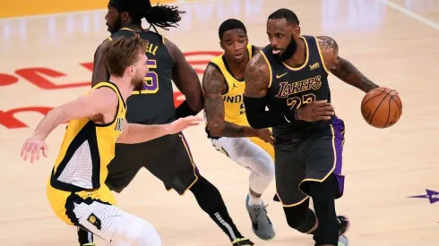 LeBron James and Montrezl Harrell vs. Domantas Sabonis. (Getty)