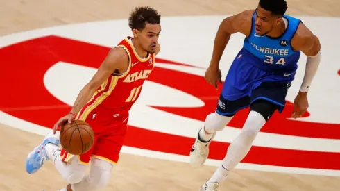 Giannis Antetokounmpo guarding Trae Young. (Getty)