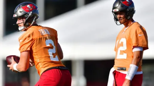 Kyle Trask (left) gets ready for the preason with Tom Brady (right). (Getty)