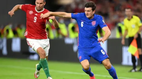Adam Szalai of Hungary (left) fights for ball control against Harry Maguire of England