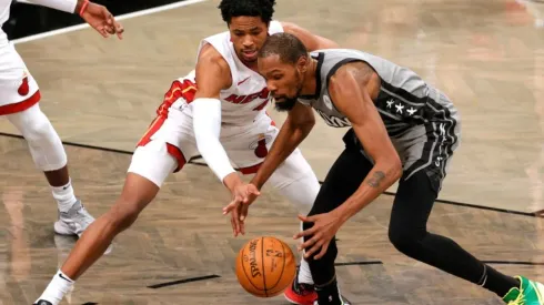 KZ Okpala of Miami Heat (left) and Kevin Durant of the Nets