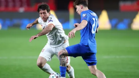 Mikel Oyarzabal of Spain (left) tries to steal the ball from Kostas Tsimikas of Greece