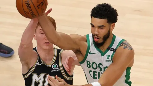 Kevin Huerter of the Hawks (left) and Jayson Tatum of Celtics